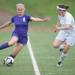 Pioneer's Mackenzie Sapp drives the ball up field in the first half the district finals, Friday May 31.
Courtney Sacco I AnnArbor.com